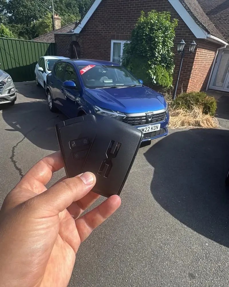 Dacia opened without damage and a fresh key supplied on a driveway